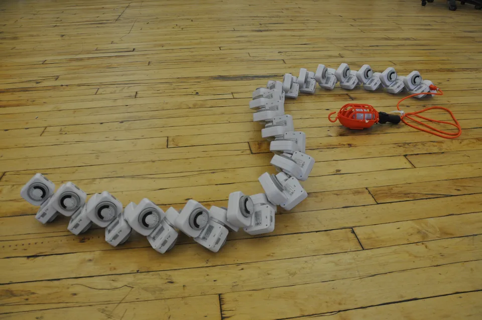 A chain of electrical timers connected to a trouble light