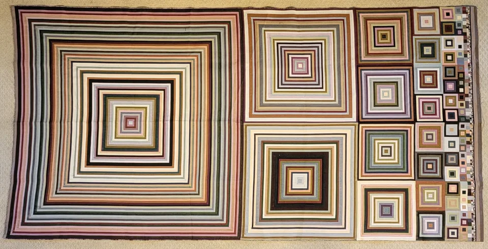 Nested colored squares of different sizes form a long vertical woven composition.