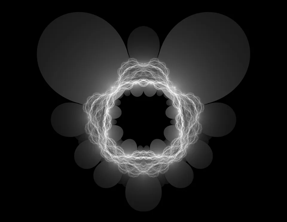 A ring of fine white loops is surrounded by large and small translucent gray circles on black.