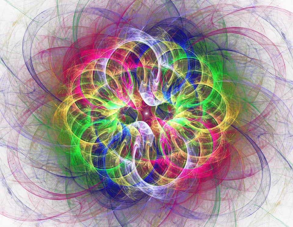 Fine red, yellow, green, and blue loops form a bright circular cluster over a pale gray field.