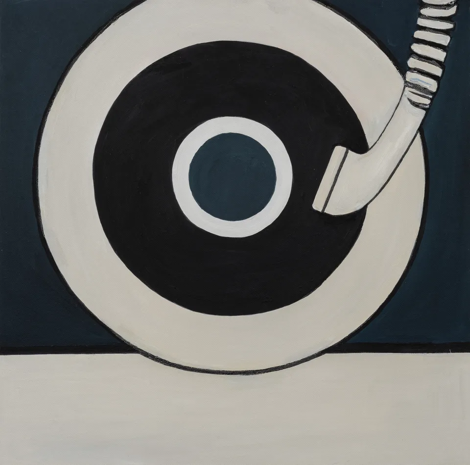 Black and cream concentric circles meet a curved striped form against a dark blue background.