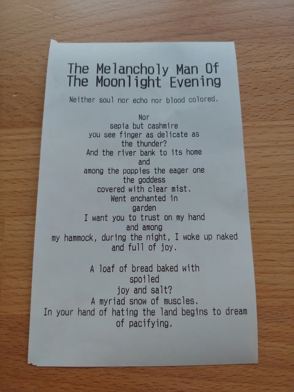 A generated poem printed on a narrow strip of paper for TokenArt