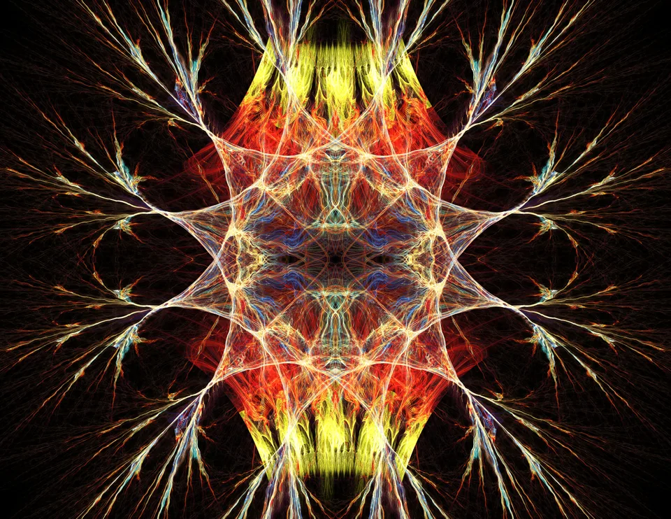 Mirrored orange, red, yellow, and white branching lines form a dense symmetrical pattern against black.