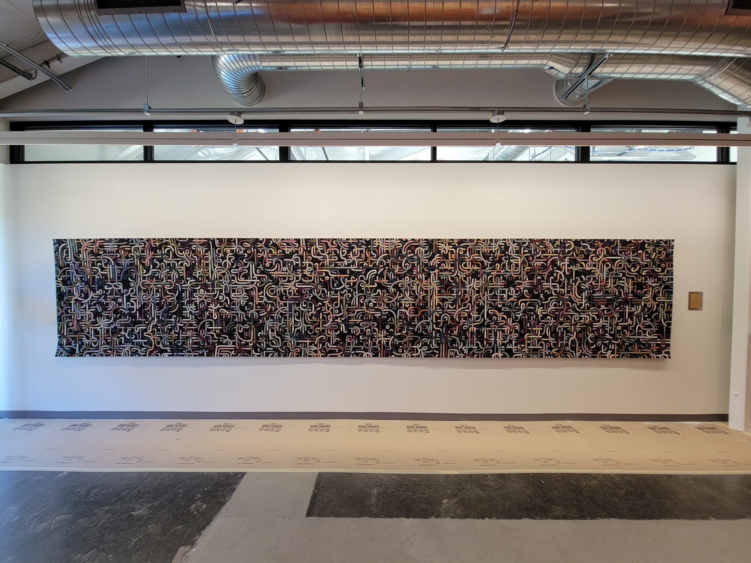 Woven tapestry with a pattern generated by code, from the Tapestries series